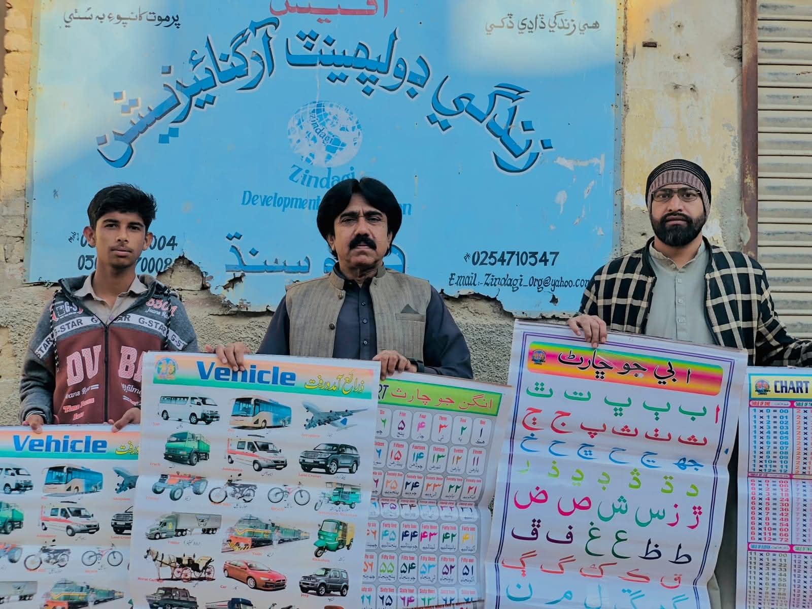 Education charts and learning materials being distributed