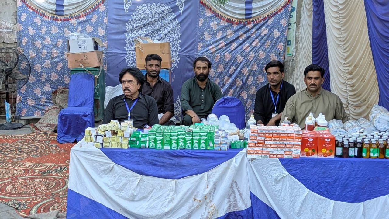 Volunteers organising a community health camp