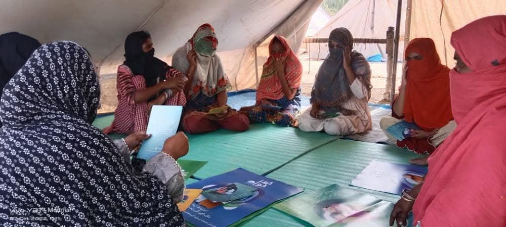 Women attending a community health and rights awareness session
